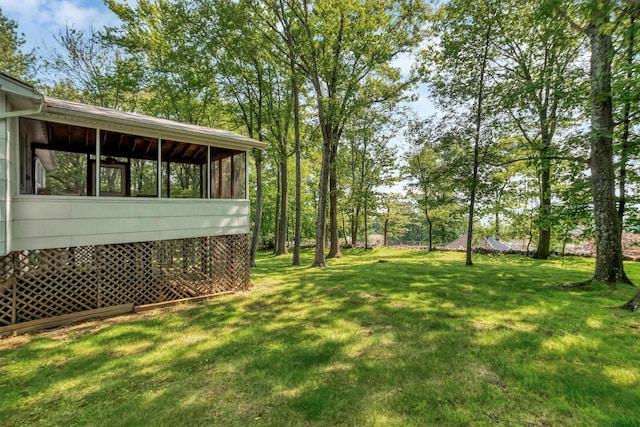 17 Woodrum Dr, Stony Point, NY 10980 - view of green lawn featuring a sunroom