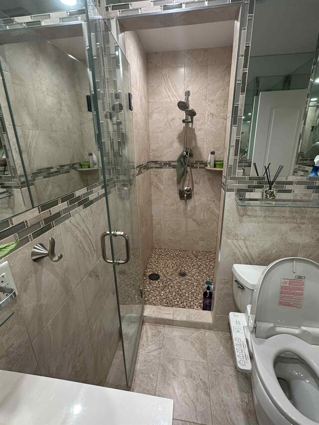2936 216th St, Bayside, NY 11360 - full bathroom with washer / clothes dryer and a stall shower