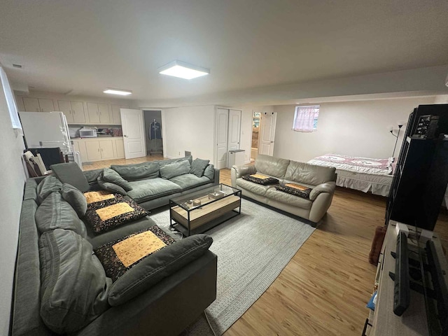 2936 216th St, Bayside, NY 11360 - living room with light wood-style floors
