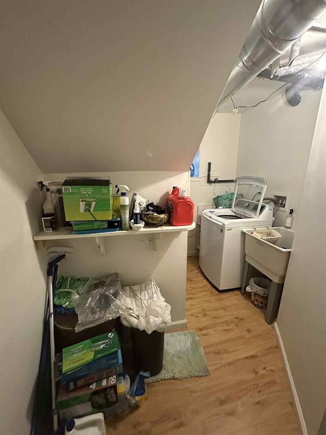 2936 216th St, Bayside, NY 11360 - washroom featuring washing machine and clothes dryer and light wood-style flooring