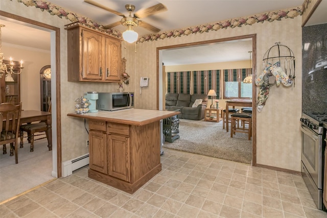2 Valley View Cir, Warwick, NY 10990 - kitchen featuring stainless steel appliances, tile counters, a baseboard radiator, light carpet, and crown molding
