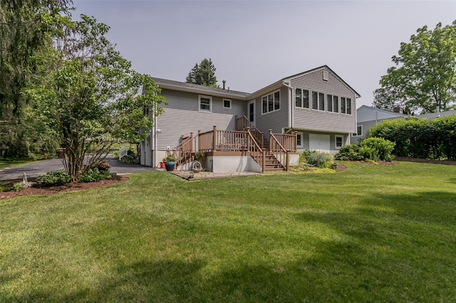 2 Valley View Cir, Warwick, NY 10990 - back of house with stairs, asphalt driveway, a yard, and a garage