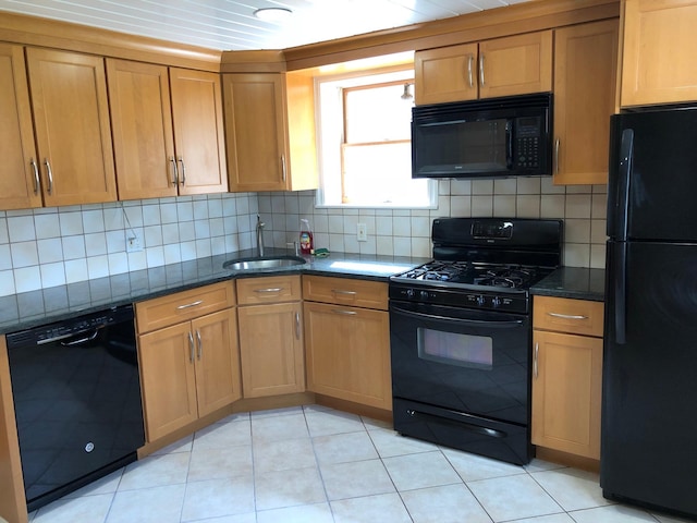 32 Beaver Hill Rd, Elmsford, NY 10523 - kitchen featuring black appliances, dark stone countertops, and tasteful backsplash
