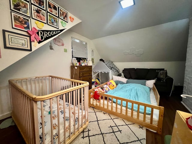 32 Beaver Hill Rd, Elmsford, NY 10523 - bedroom featuring vaulted ceiling and wood finished floors