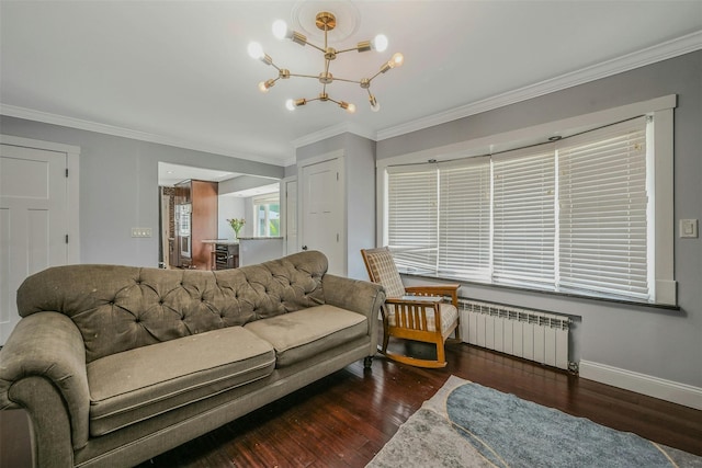 2 Janet Ln, Commack, NY 11725 - living room with radiator heating unit, ornamental molding, wood finished floors, and a chandelier