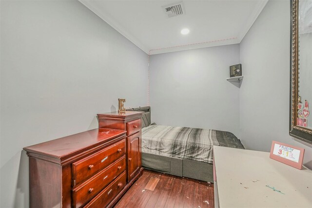 2 Janet Ln, Commack, NY 11725 - bedroom with dark wood-style floors and crown molding
