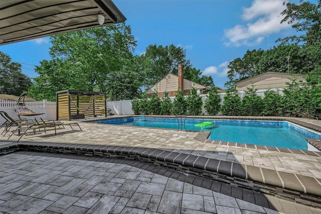 2 Janet Ln, Commack, NY 11725 - view of swimming pool featuring a patio and a fenced backyard