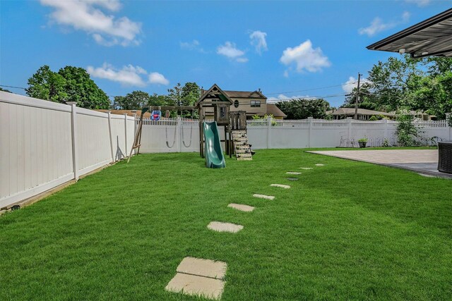2 Janet Ln, Commack, NY 11725 - fenced backyard with a playground and a patio