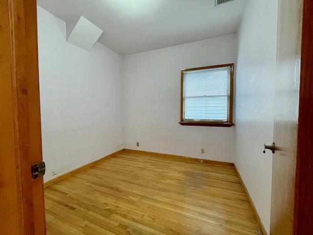 53-80 72nd Pl, Maspeth, NY 11378 - empty room featuring light wood-type flooring and baseboards