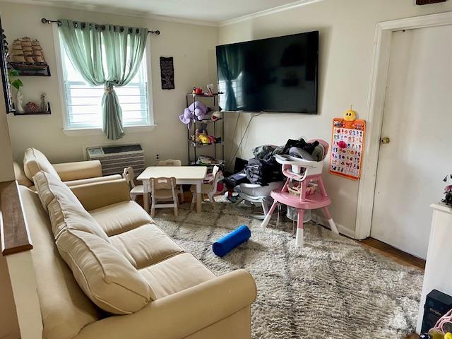 53-80 72nd Pl, Maspeth, NY 11378 - living room with ornamental molding and wood finished floors