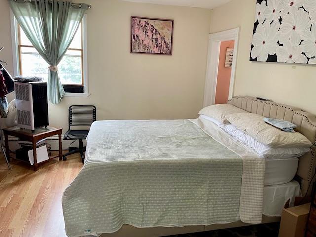 53-80 72nd Pl, Maspeth, NY 11378 - bedroom with wood finished floors