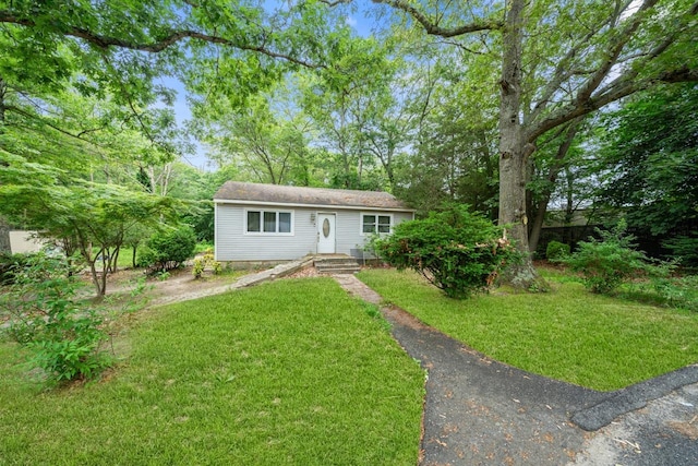 16 Fife Dr, Coram, NY 11727 - view of front of home with a front lawn