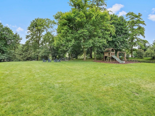 1 Midland Gdns Unit 4A, Bronxville, NY 10708 - view of green lawn featuring a playground