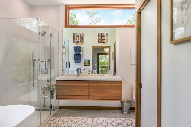 34 Old Neck Rd S, Center Moriches, NY 11934 - full bathroom featuring vanity, a soaking tub, a stall shower, and tile patterned floors