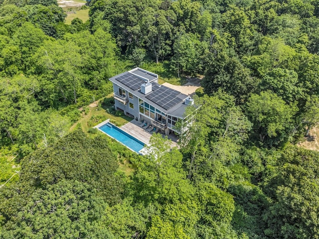 34 Old Neck Rd S, Center Moriches, NY 11934 - aerial view of property and surrounding area featuring a heavily wooded area and a pool area