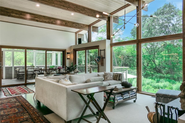 34 Old Neck Rd S, Center Moriches, NY 11934 - living room with a towering ceiling, beam ceiling, and healthy amount of natural light