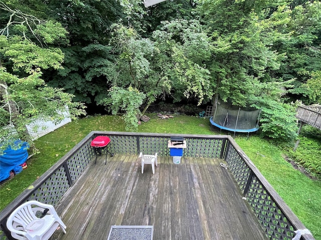 20 Pine Ave, Ossining, NY 10562 - wooden deck featuring a trampoline and a yard