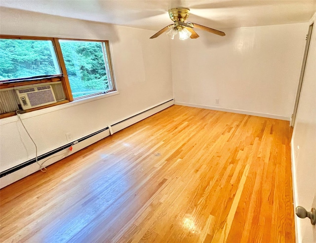 20 Pine Ave, Ossining, NY 10562 - unfurnished room with baseboard heating, wood finished floors, ceiling fan, and cooling unit
