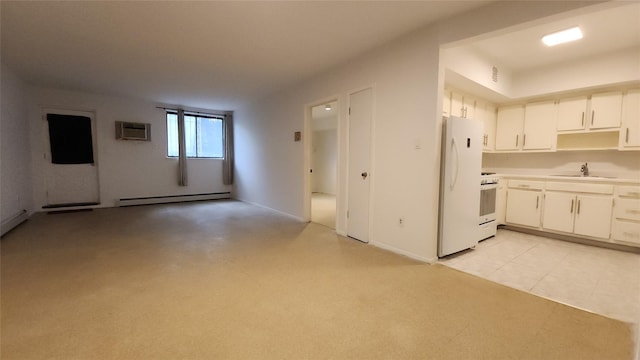 5323 82nd St, Elmhurst, NY 11373 - kitchen featuring white appliances, a baseboard radiator, light countertops, a wall mounted AC, and white cabinets