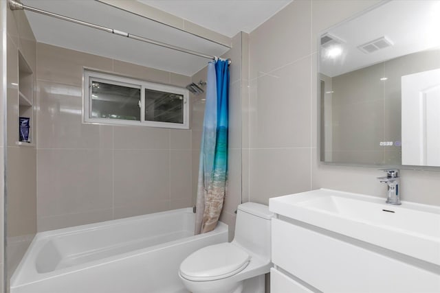 27 Heron Ln, Commack, NY 11725 - bathroom with shower / bath combo with shower curtain and vanity