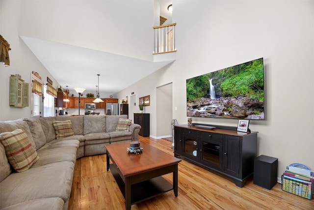 85 Decker Dr, Walden, NY 12586 - living room featuring light wood-type flooring and a high ceiling