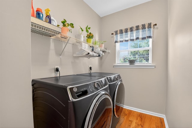 85 Decker Dr, Walden, NY 12586 - laundry area featuring separate washer and dryer and wood finished floors