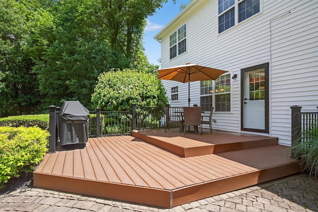 85 Decker Dr, Walden, NY 12586 - wooden deck with outdoor dining space and area for grilling