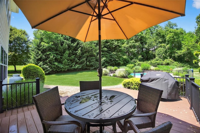 85 Decker Dr, Walden, NY 12586 - wooden terrace featuring a grill, outdoor dining space, a yard, and view of scattered trees