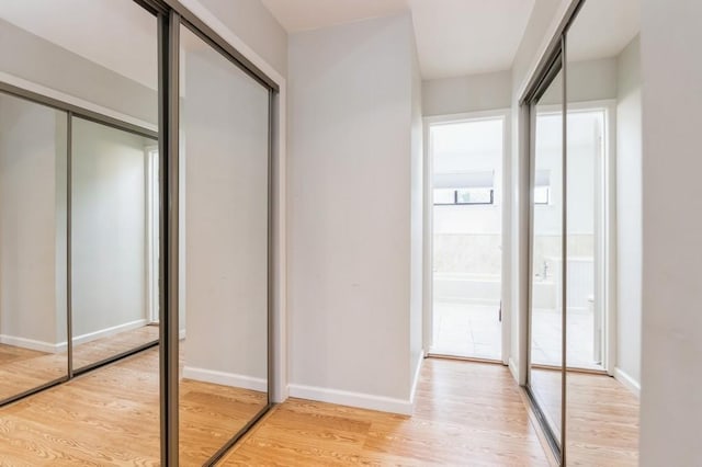 175 Horseshoe Cir, Ossining, NY 10562 - corridor featuring light wood-style floors and baseboards