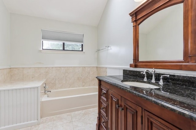 175 Horseshoe Cir, Ossining, NY 10562 - bathroom featuring vanity, a garden tub, and lofted ceiling