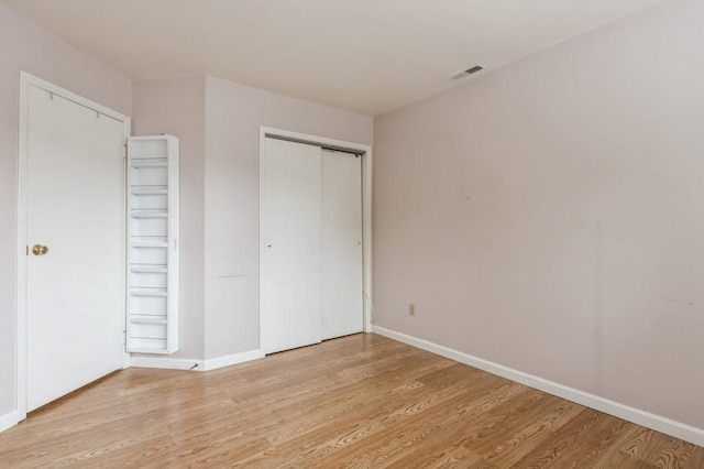 175 Horseshoe Cir, Ossining, NY 10562 - unfurnished bedroom featuring light wood finished floors and baseboards