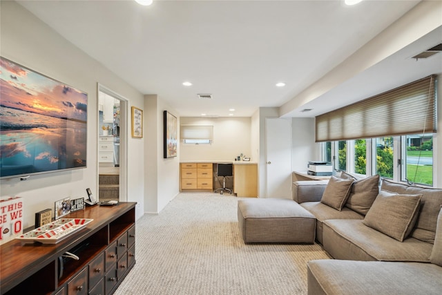 9 Elaine Pl, Plainview, NY 11803 - living room featuring carpet, recessed lighting, and built in study area