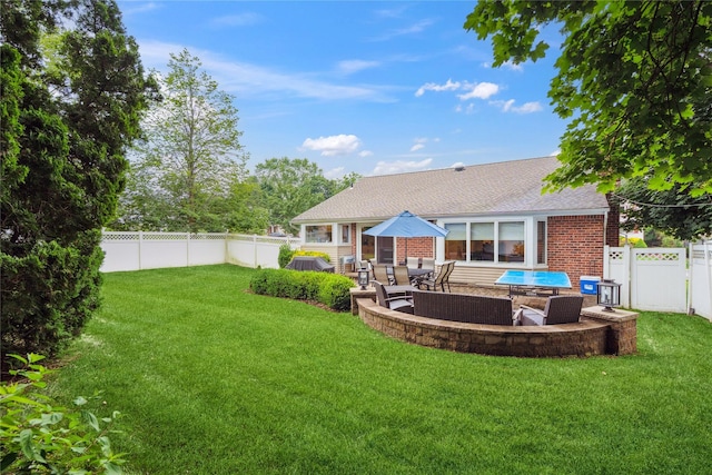 9 Elaine Pl, Plainview, NY 11803 - rear view of house featuring a patio, a fenced backyard, brick siding, and roof with shingles