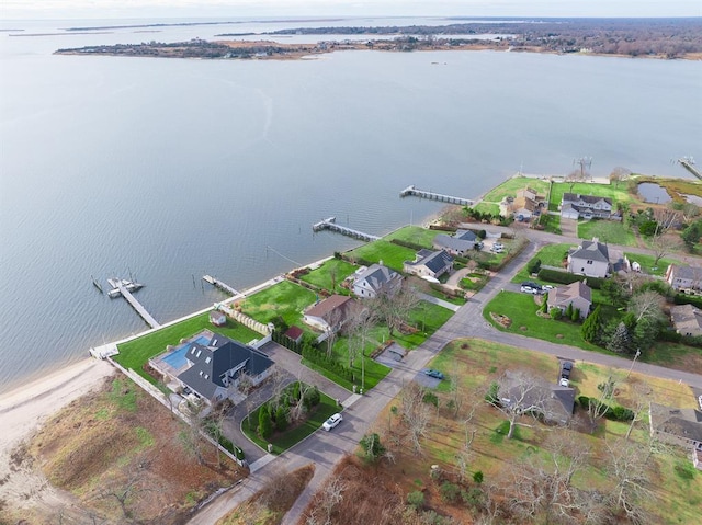 8 Bay St, East Moriches, NY 11940 - aerial view of property and surrounding area featuring a large body of water and nearby suburban area