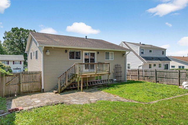 7 Fuller Rd, Ossining, NY 10562 - back of property with a fenced backyard and a patio