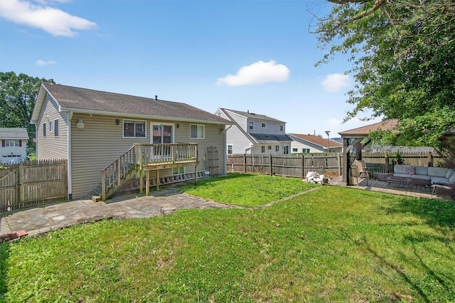7 Fuller Rd, Ossining, NY 10562 - rear view of house featuring outdoor lounge area, a fenced backyard, and a patio area