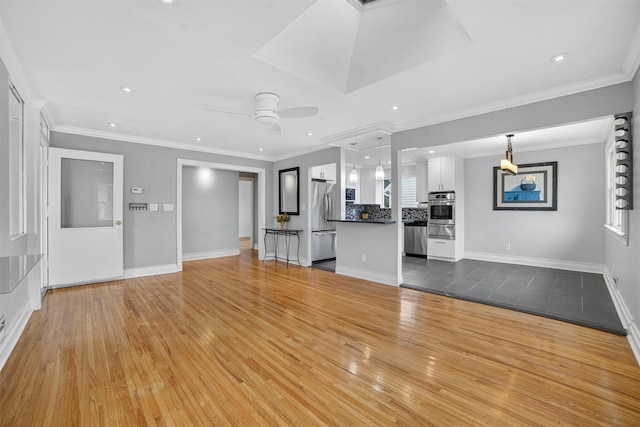 7 Fuller Rd, Ossining, NY 10562 - unfurnished living room with light wood finished floors, ceiling fan, recessed lighting, and ornamental molding