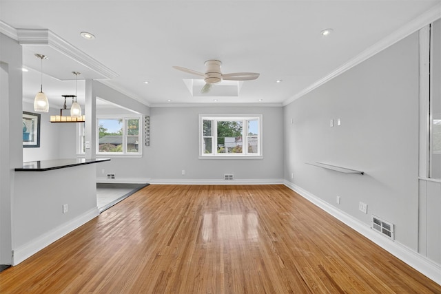7 Fuller Rd, Ossining, NY 10562 - unfurnished living room featuring light wood finished floors, ceiling fan, crown molding, and recessed lighting