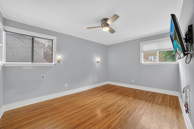 7 Fuller Rd, Ossining, NY 10562 - spare room with wood finished floors, a ceiling fan, and crown molding