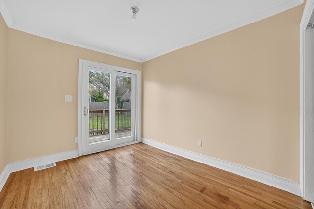 7 Fuller Rd, Ossining, NY 10562 - empty room featuring light wood-style floors and ornamental molding