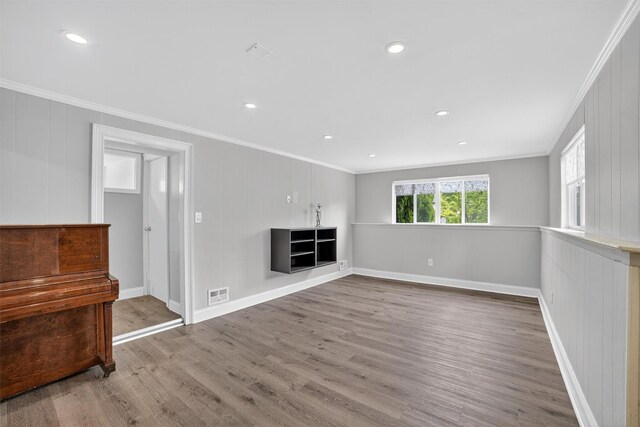 7 Fuller Rd, Ossining, NY 10562 - unfurnished living room featuring ornamental molding, wood finished floors, and recessed lighting