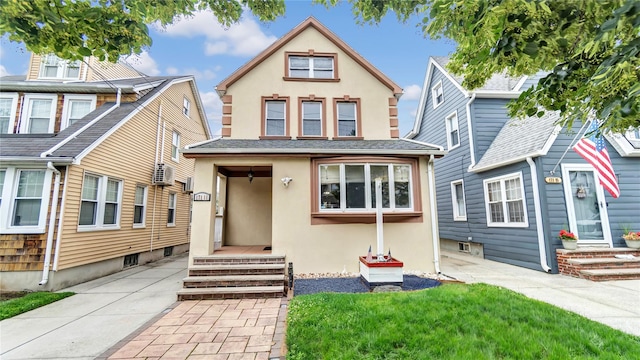 17111 Bagley Ave, Flushing, NY 11358 - traditional-style home with stucco siding
