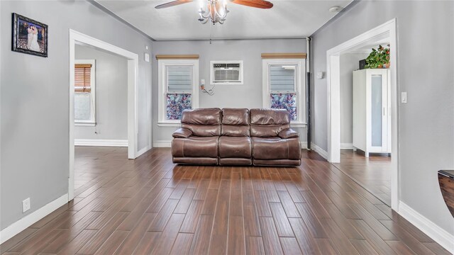 17111 Bagley Ave, Flushing, NY 11358 - living room with a wall mounted air conditioner, a ceiling fan, and dark wood-style flooring