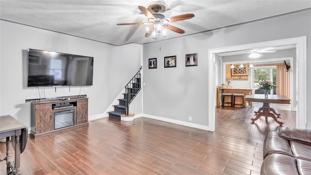 17111 Bagley Ave, Flushing, NY 11358 - living room featuring ceiling fan, stairway, and wood finished floors