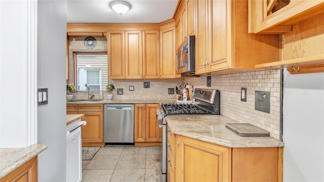 17111 Bagley Ave, Flushing, NY 11358 - kitchen featuring appliances with stainless steel finishes, tasteful backsplash, open shelves, light stone counters, and light tile patterned floors
