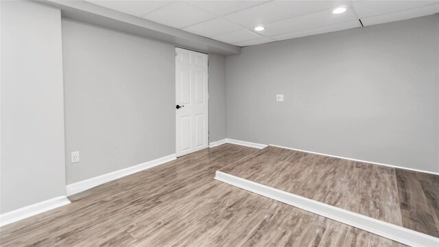 17111 Bagley Ave, Flushing, NY 11358 - finished below grade area with wood finished floors, recessed lighting, and a paneled ceiling