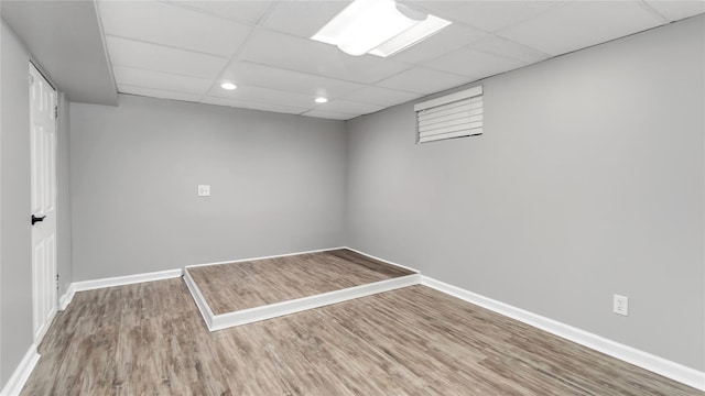 17111 Bagley Ave, Flushing, NY 11358 - spare room featuring a drop ceiling, wood finished floors, and recessed lighting