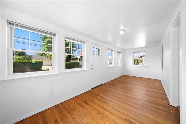 65 Schmeelk Pl, Copiague, NY 11726 - entrance foyer featuring light wood-style flooring and baseboards