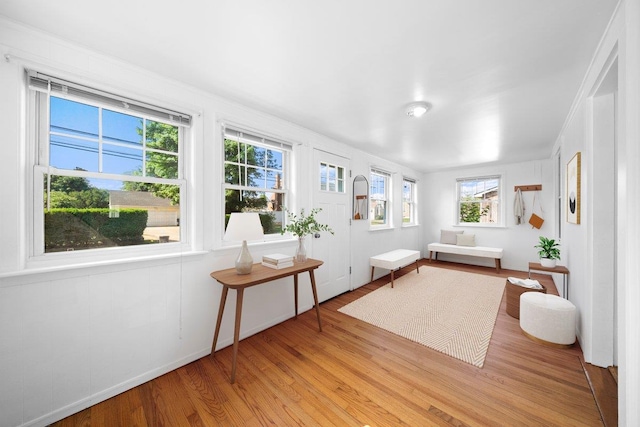 65 Schmeelk Pl, Copiague, NY 11726 - living area featuring wood finished floors and baseboards