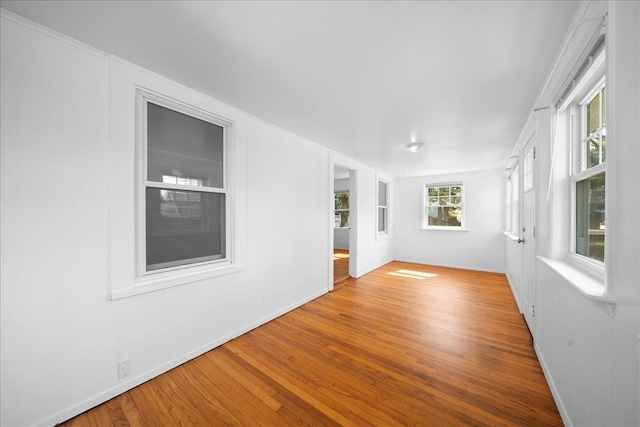 65 Schmeelk Pl, Copiague, NY 11726 - spare room with wood finished floors and baseboards